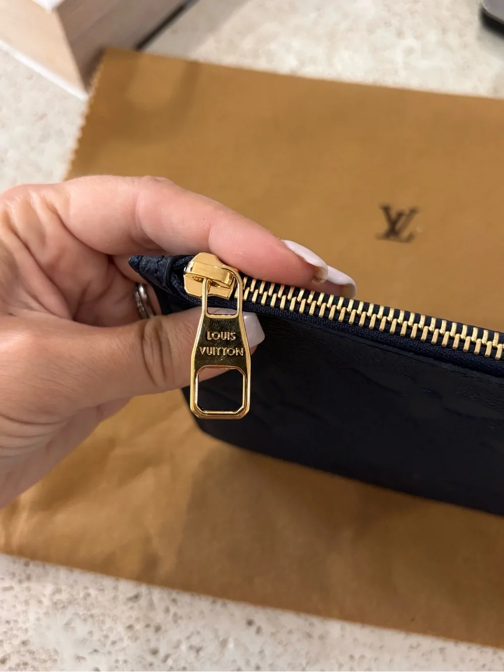 Authentic Louis Vuitton Neverfull GM Empreinte giant monogram pouch wristlet